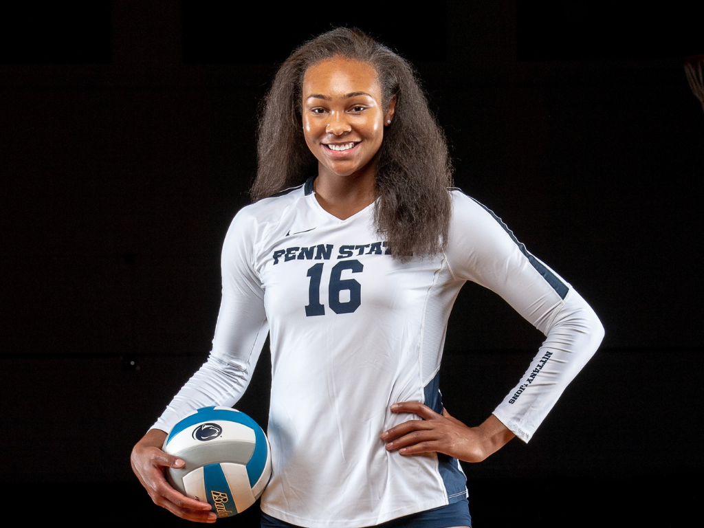 Serena Gray holding volleyball