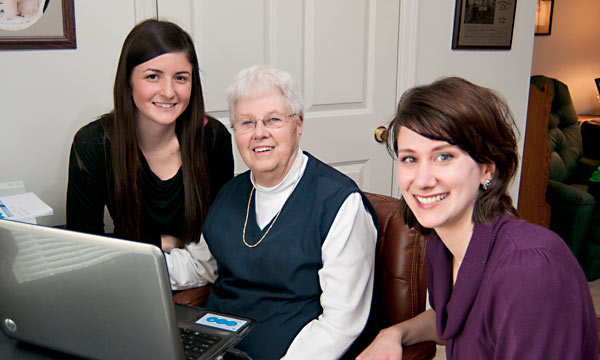 Students help resident learn to Skype