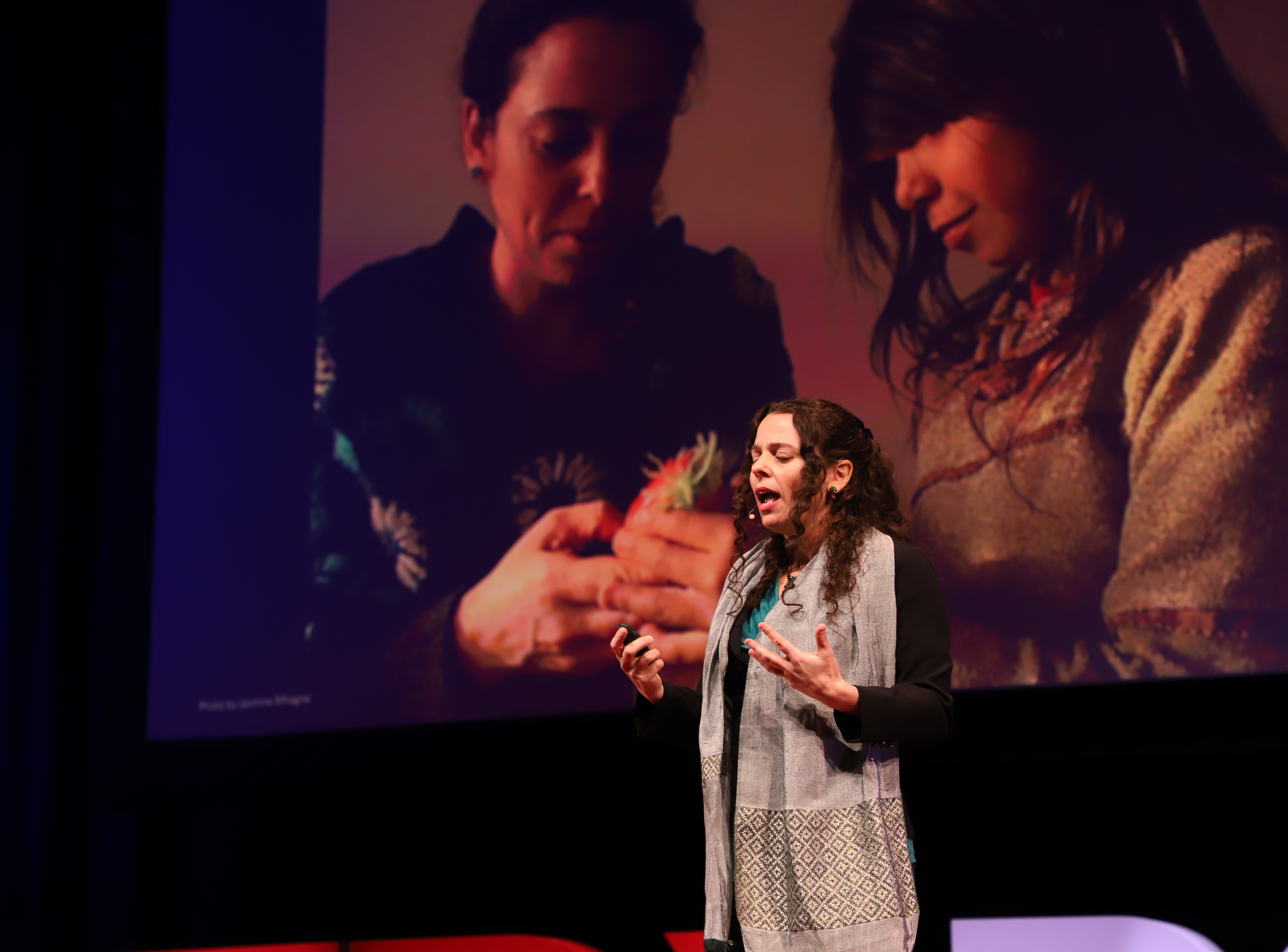 Yael Warshel giving TED Talk