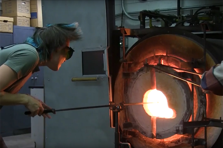 Briana Bennett in glass blowing lab