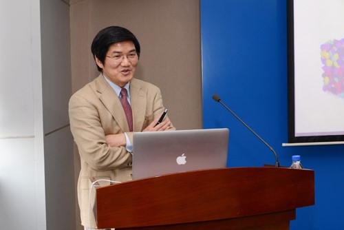 man at podium speaking