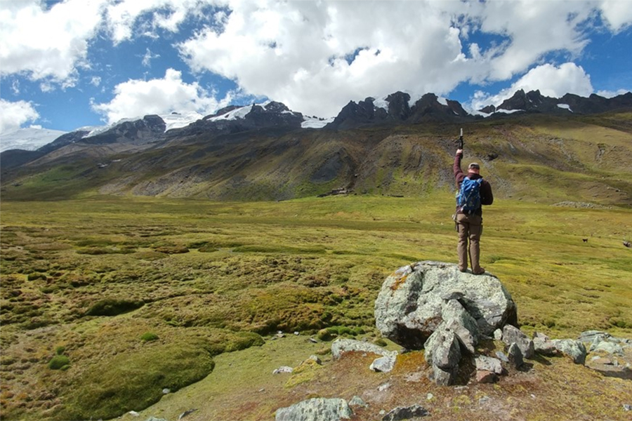 Colin Kelly setting up to take a 360-degree photo at the Paco Pampa bofedales system in Peru