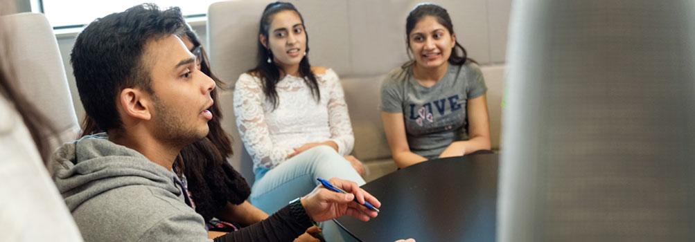 students participate in a diversity circle group discussion