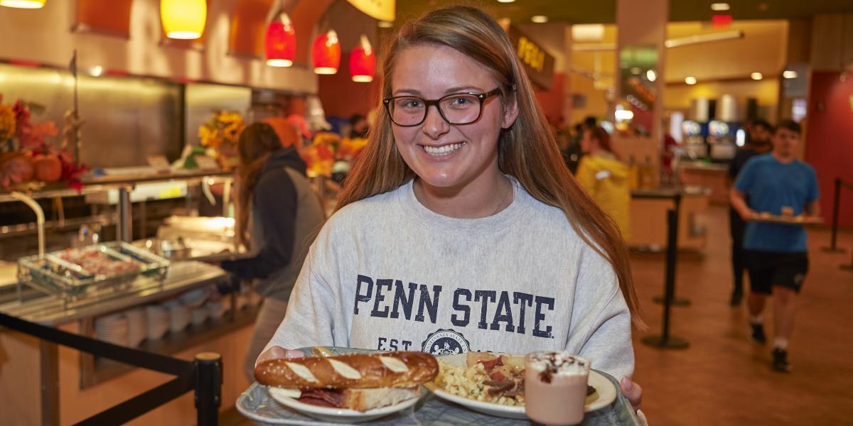 Penn State student shows off her meal in the dining commons