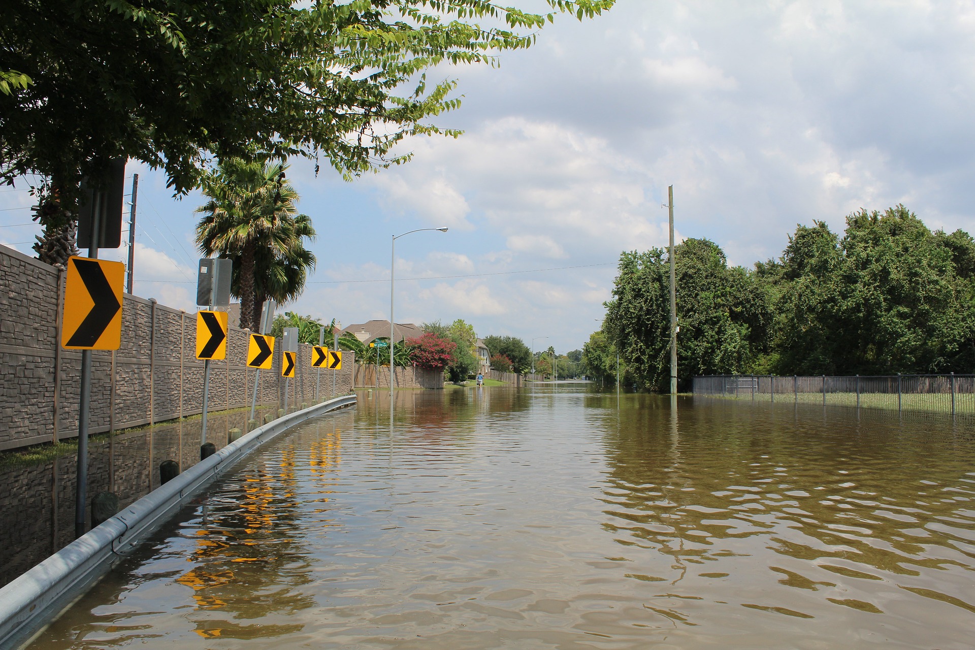 road completely submerged by flood water