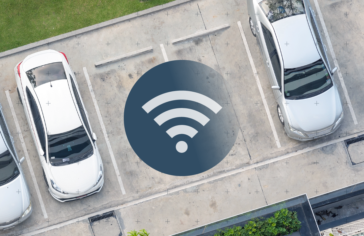 Image of parked vehicles with Wi-Fi symbol