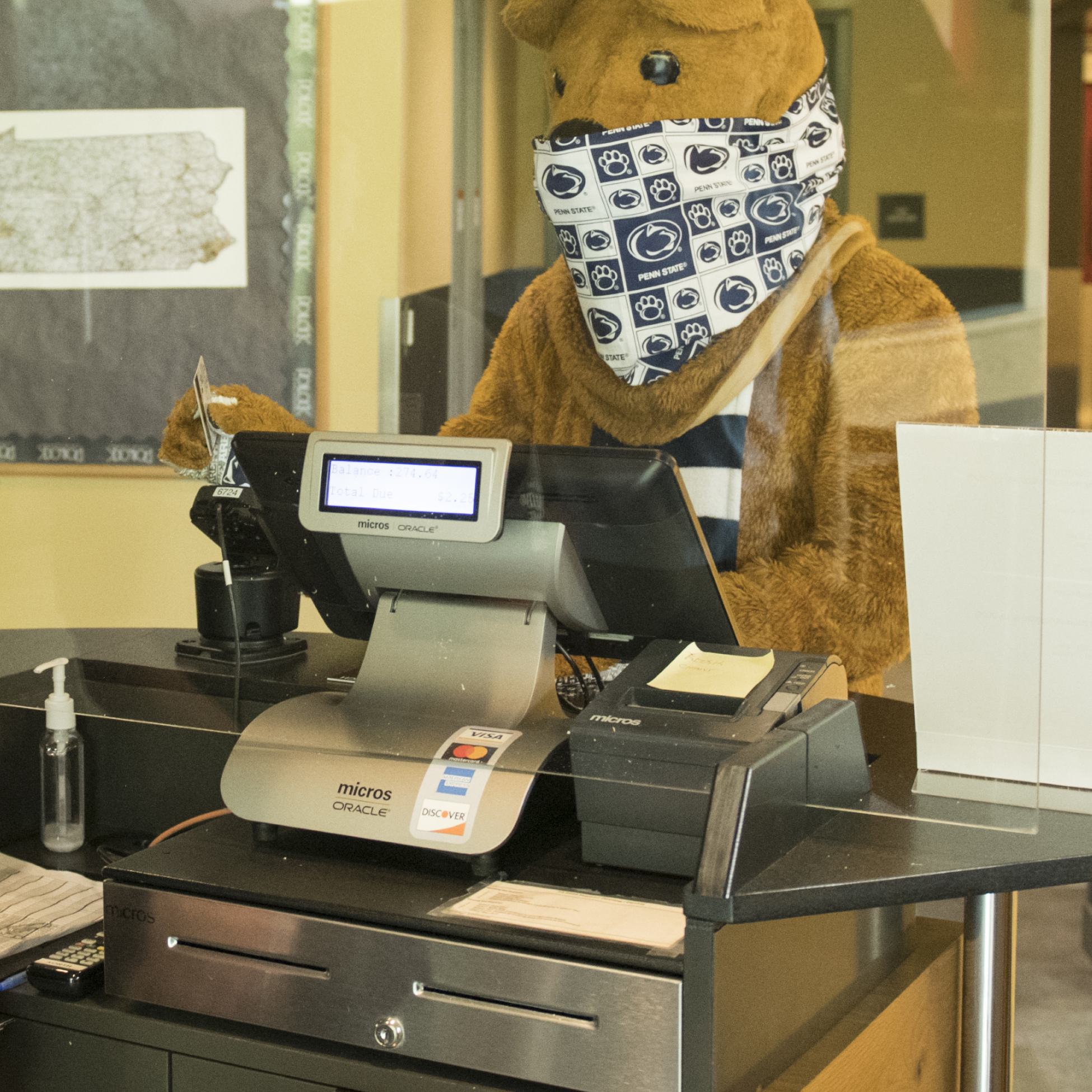 Nittany Lion swiping out hunger at the register in the dining commons