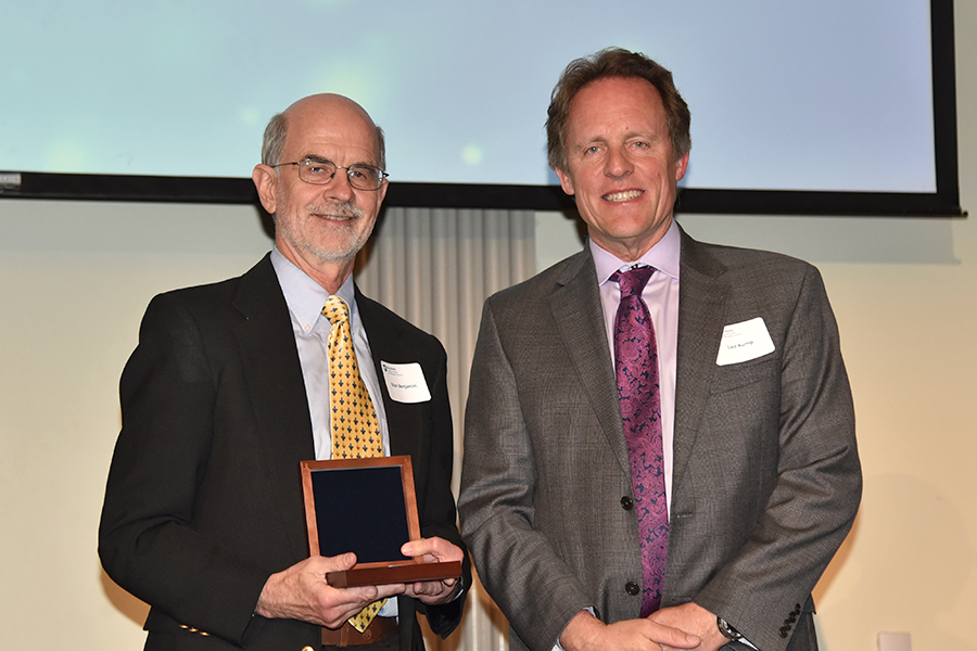 Stan Benjamin (left) accepts an award from Lee Kump at the College of Earth and Mineral Sciences' Wilson Awards Banquet