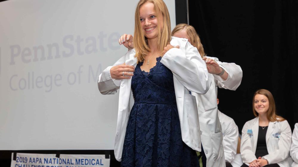 New coats, new beginnings for incoming physician assistant students ...