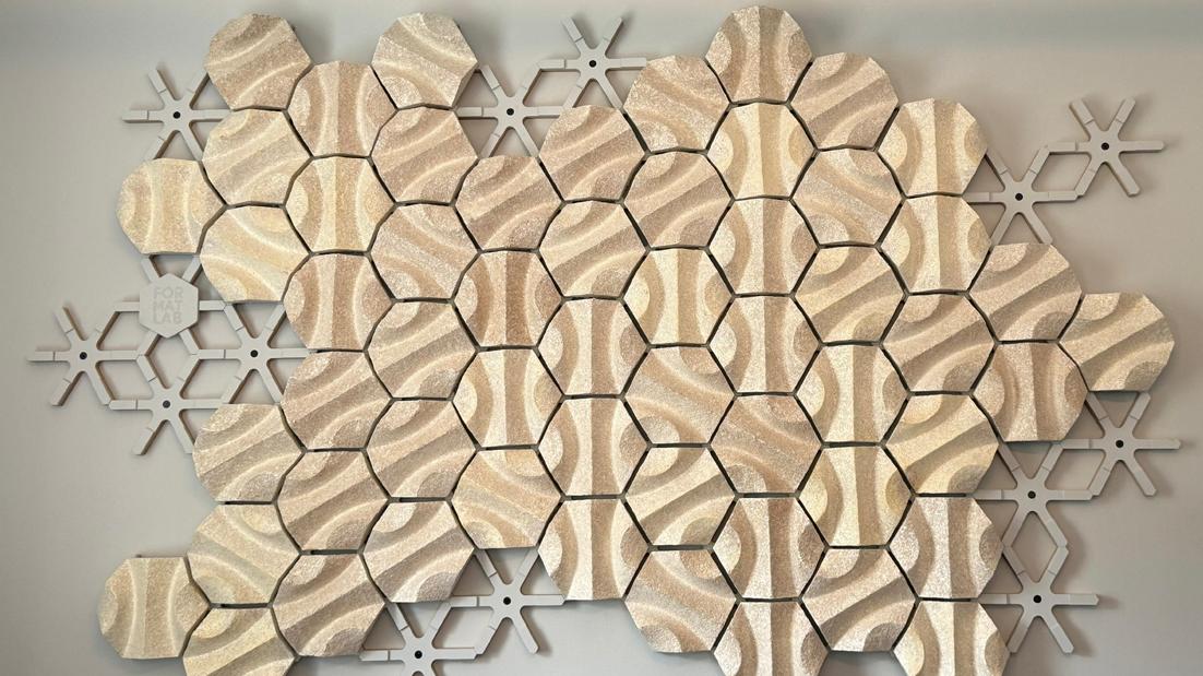 The acoustic wall installed on a wall in the provost's office.