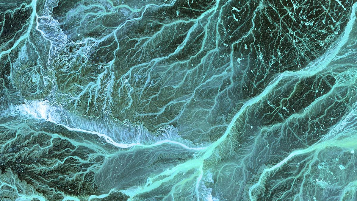 Aerial view of meandering streams through southeastern Jordan