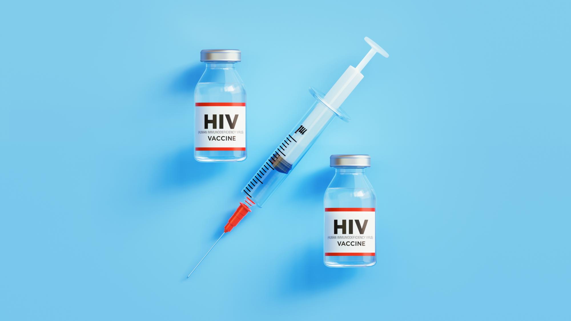 Photo illustration of two vials of HIV vaccine and a syringe
