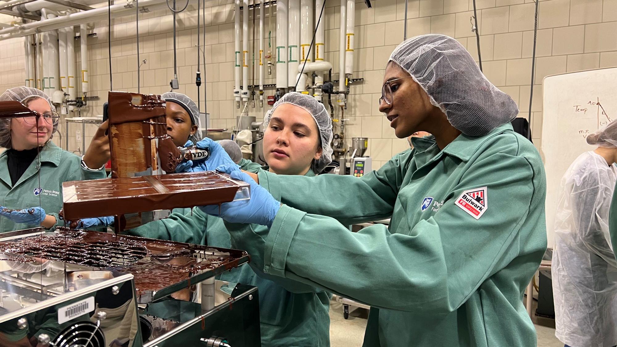 Food science students in the lab.