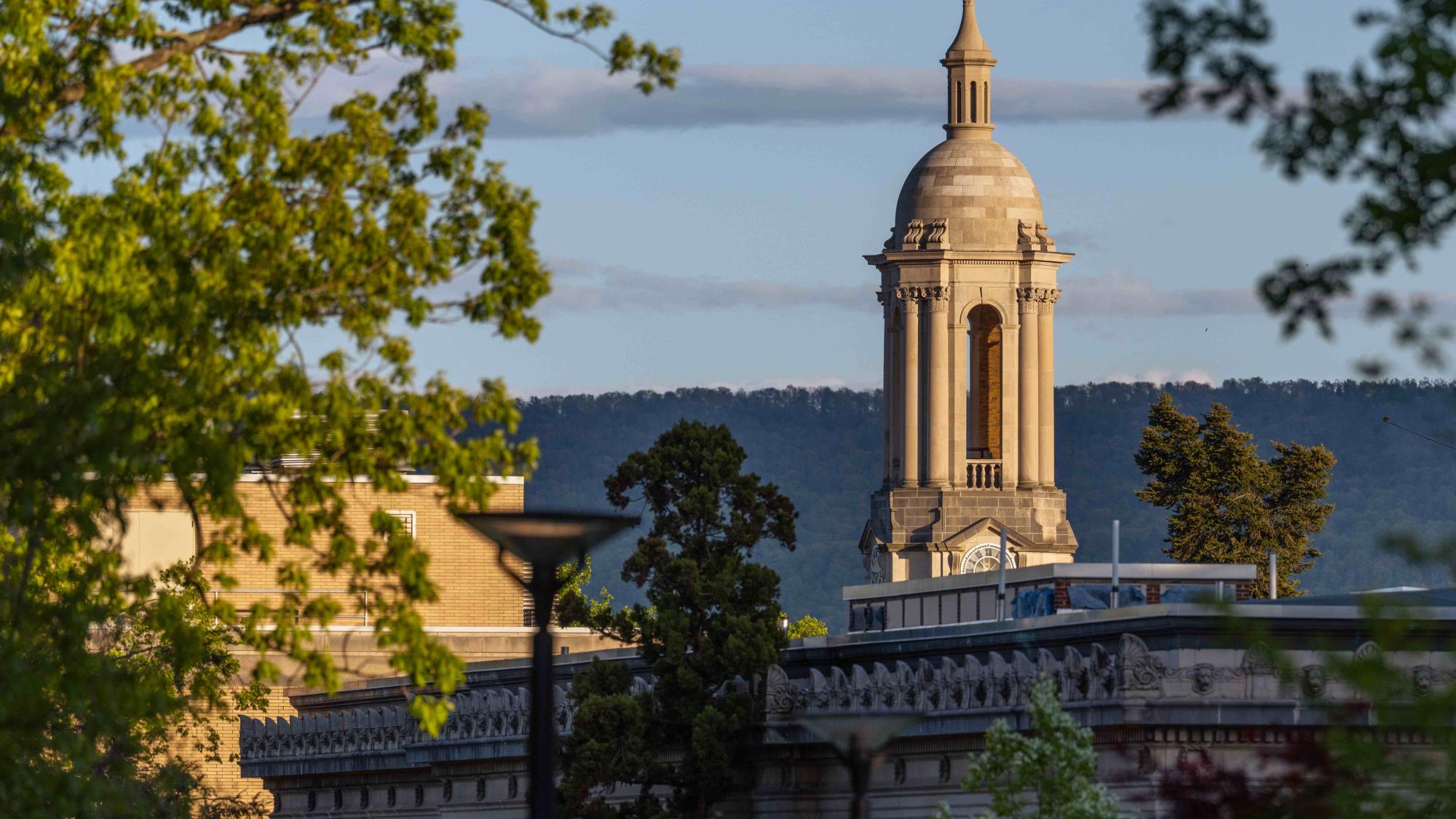 The sun shines on the Old Main bell tower