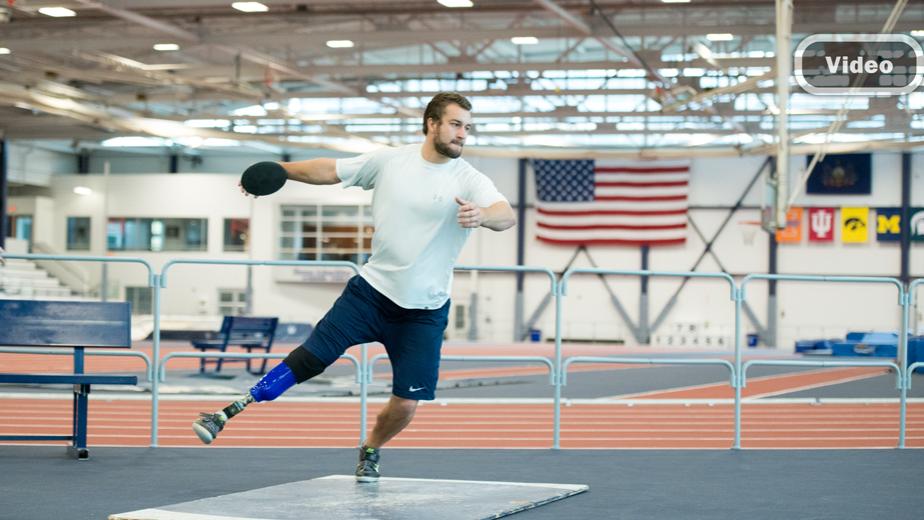 Max Rohn, a member of the Penn State Ability Athletics team, practices with the discus.