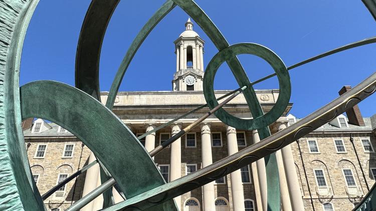 Old Main viewed through Armillary Sphere