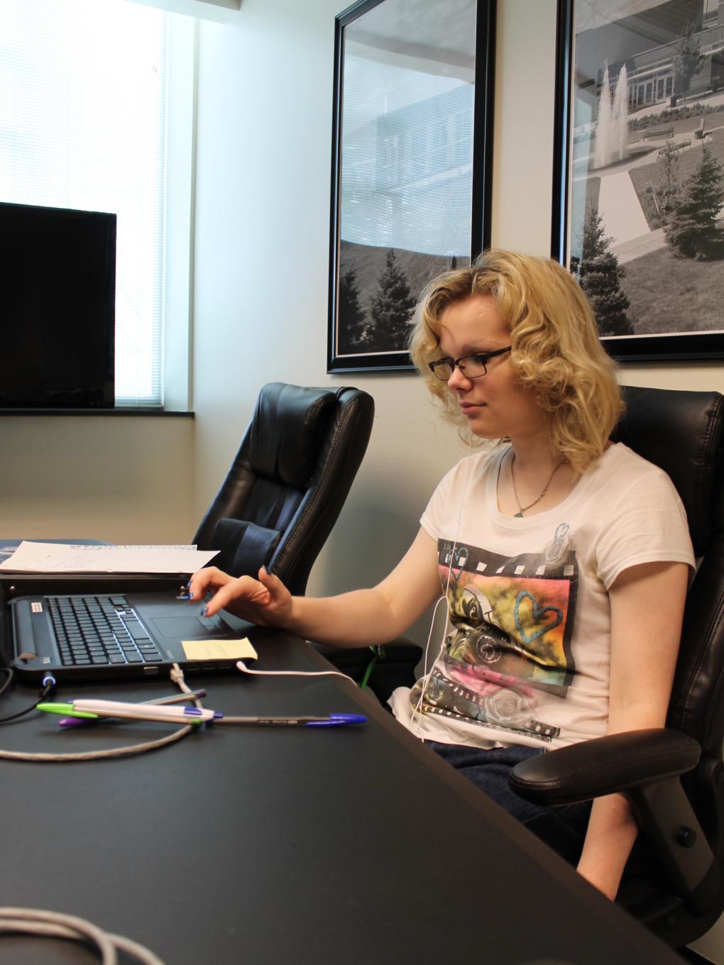 Bethany Coldren works at laptop