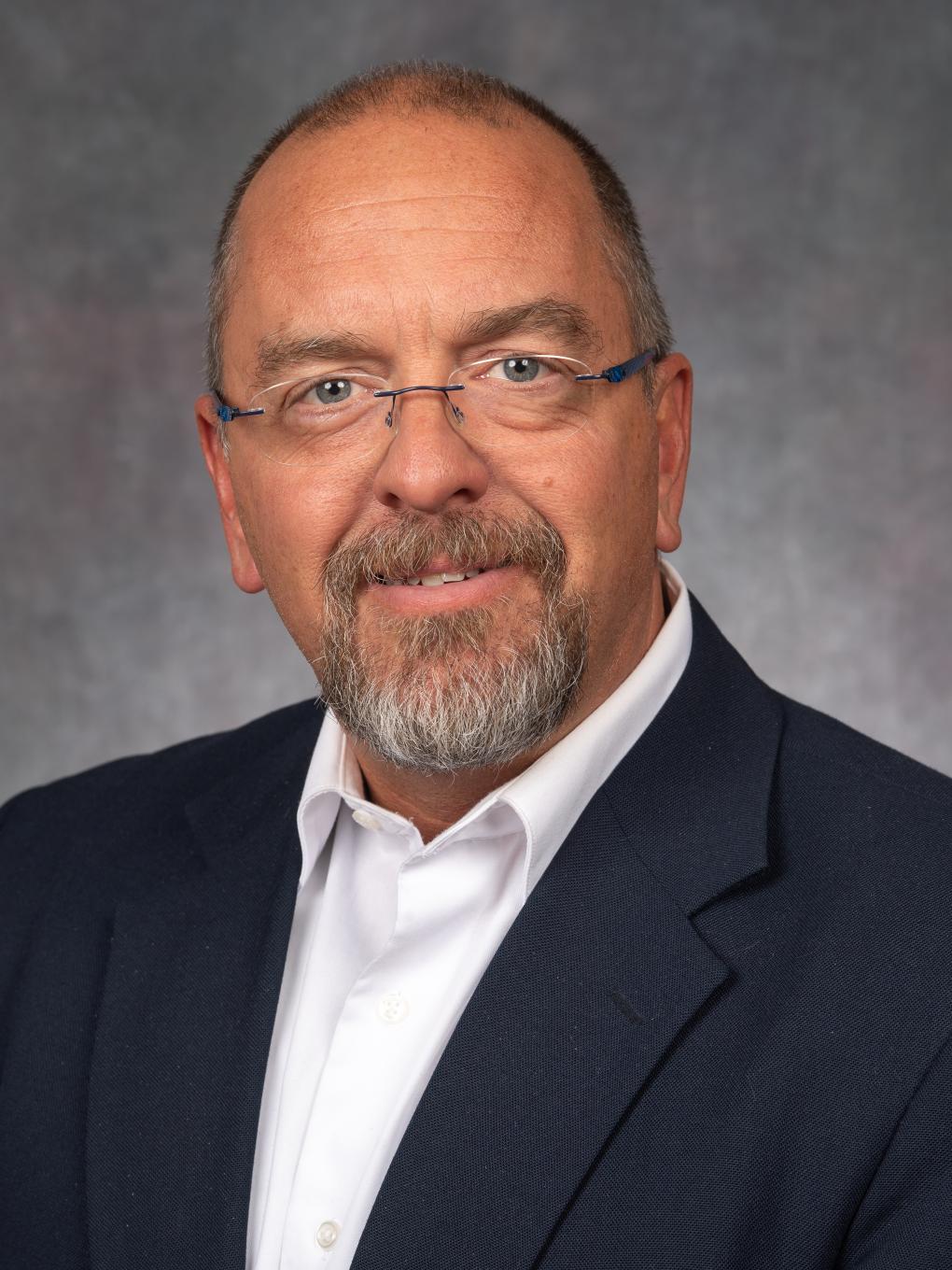 A portrait of Christopher Harben, a faculty member at Penn State Behrend's Black School of Business