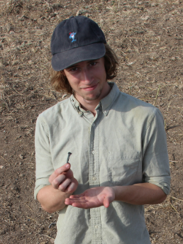 Student Ian Seasholtz with nail made by the team