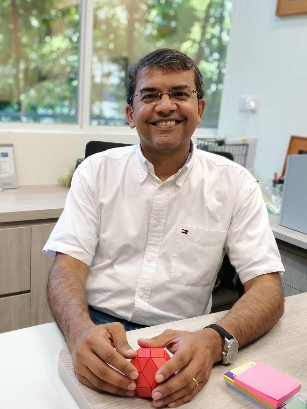 Anand at desk