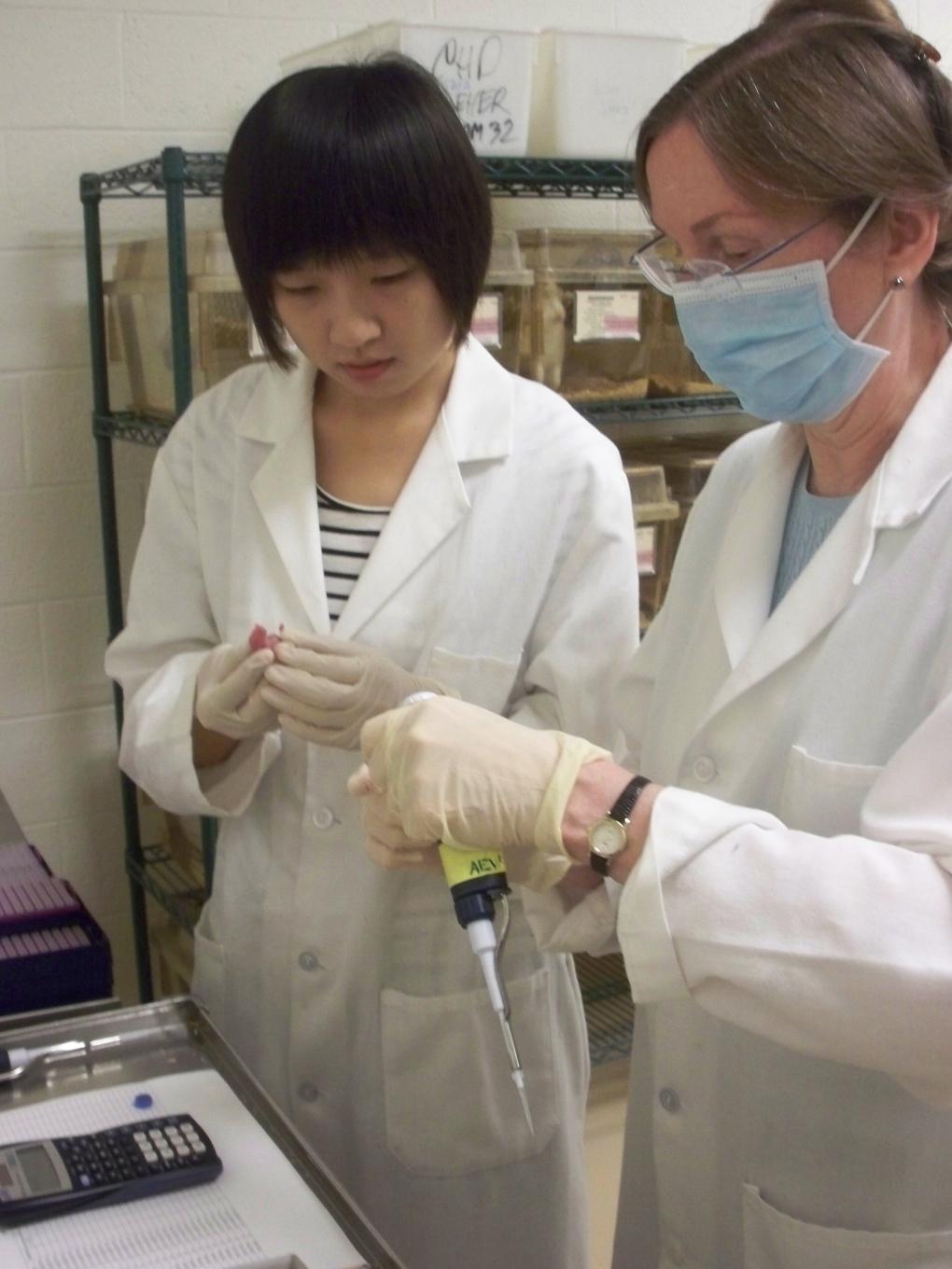 two women in lab gear