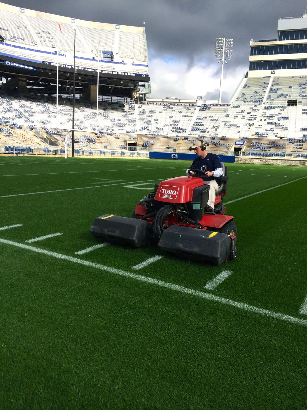 Student mows turf at Beaver Stadium