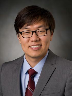 A head and shoulders photo of a man.