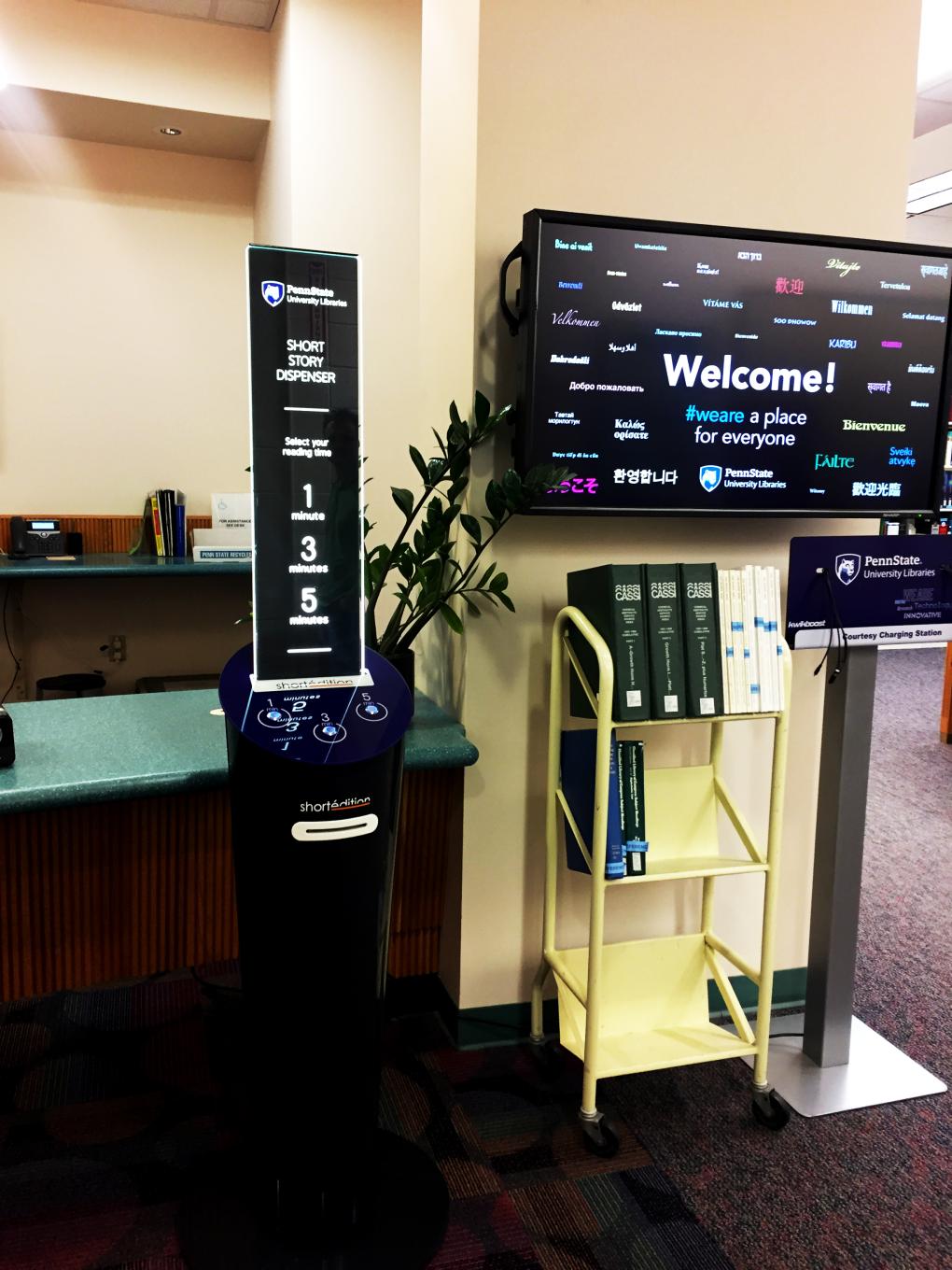 blue short story dispenser near main service desk of Physical and Mathematical Sciences Library at Penn State
