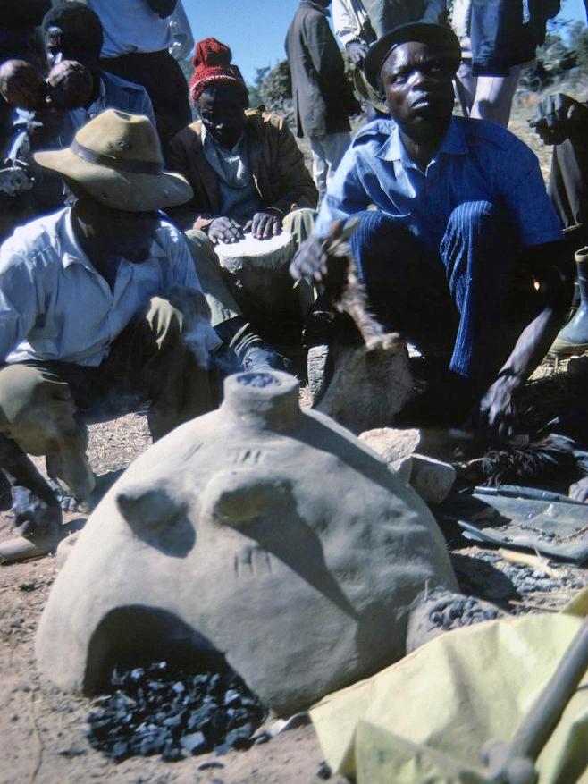 Iron-smelting reconstruction (making iron from iron ore) organized by William J. Dewey in 1988 among the Njanja subgroup (Chief Ranga’s village) of the Shona People of Zimbabwe.