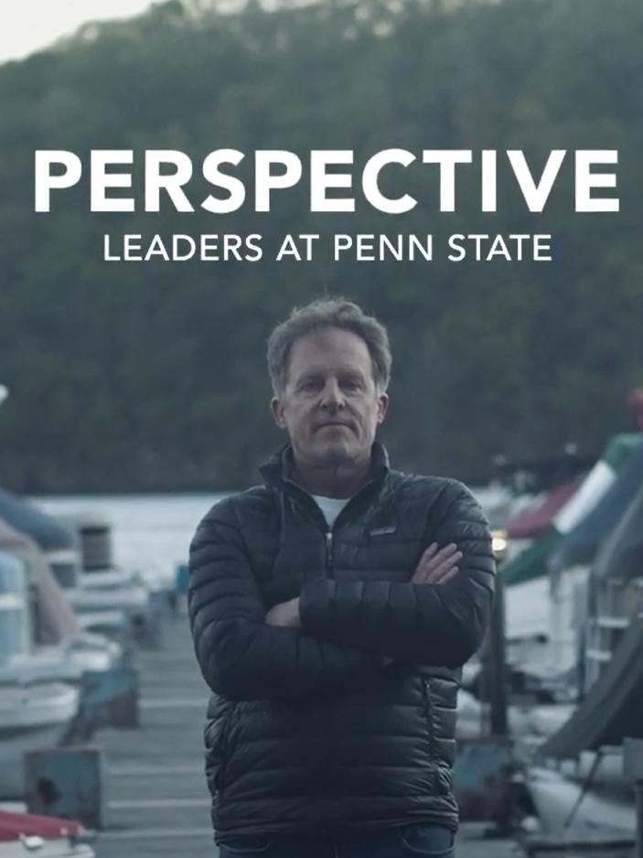 Lee Kump, John Leone Dean in the College of Earth and Mineral Sciences at Penn State, stands with his back to a dock, with boats behind him. Text in the image reads, "Perspective: Leaders at Penn State."