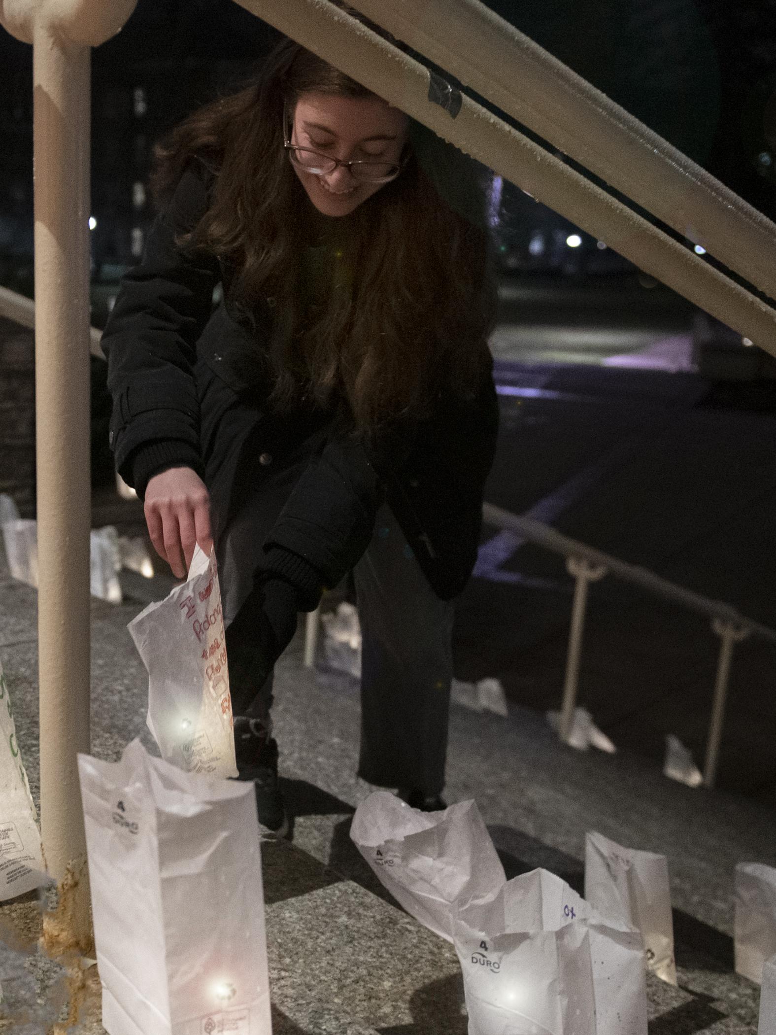 EcoReps placing bags around Old Main