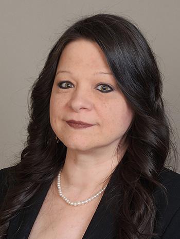 A headshot of Donna L. Butler