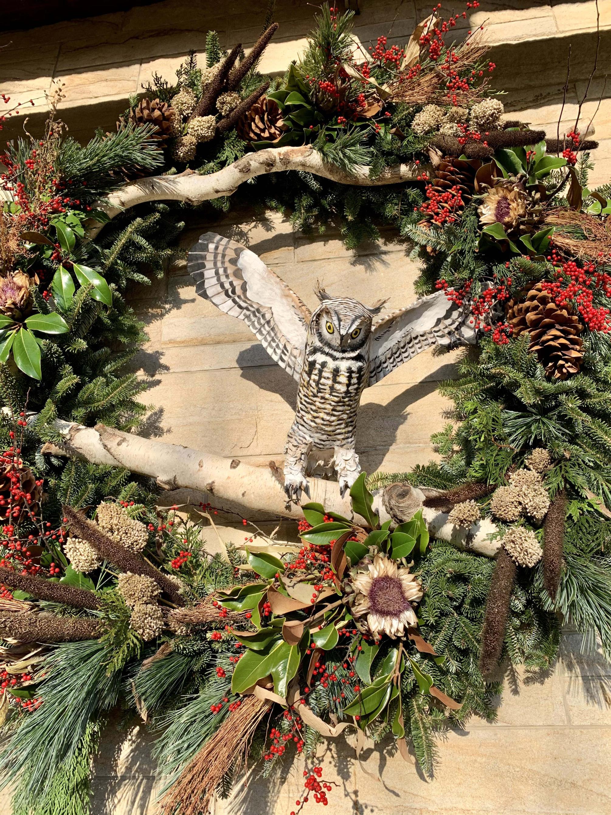 Fir wreath featuring an owl