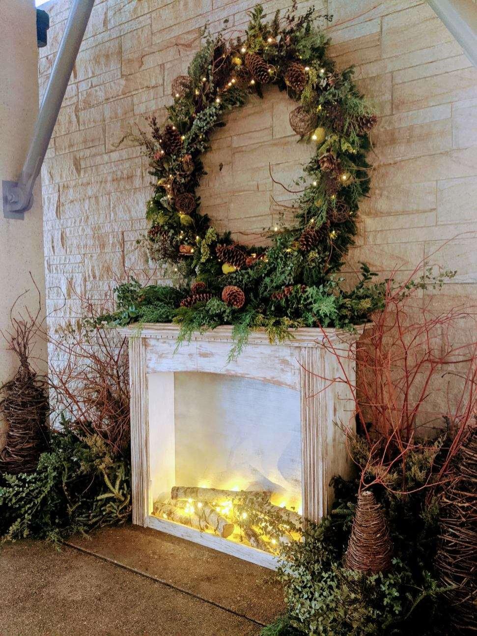 Fireplace and large wreath 