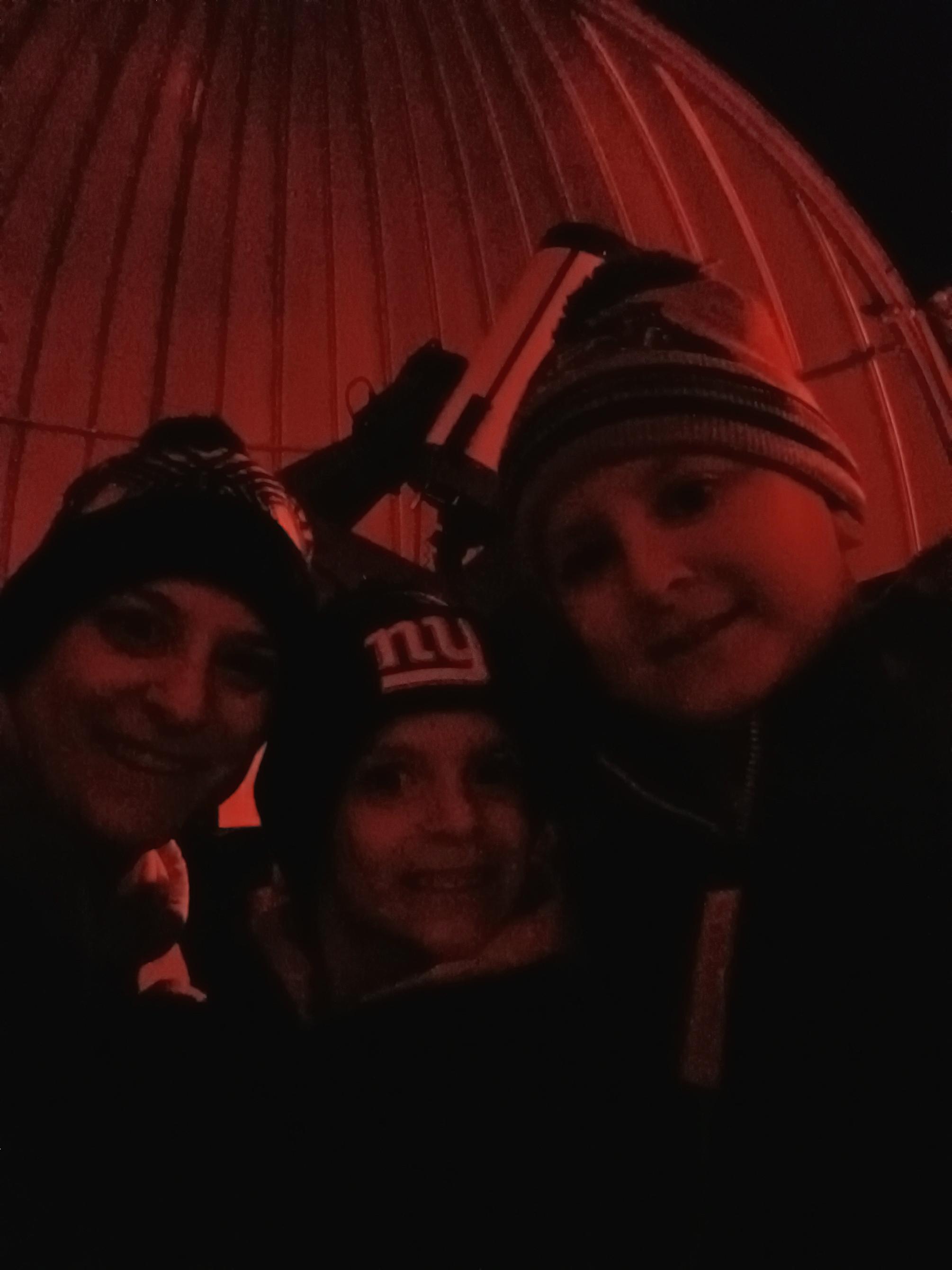 A mother and two sons inside the observatory.