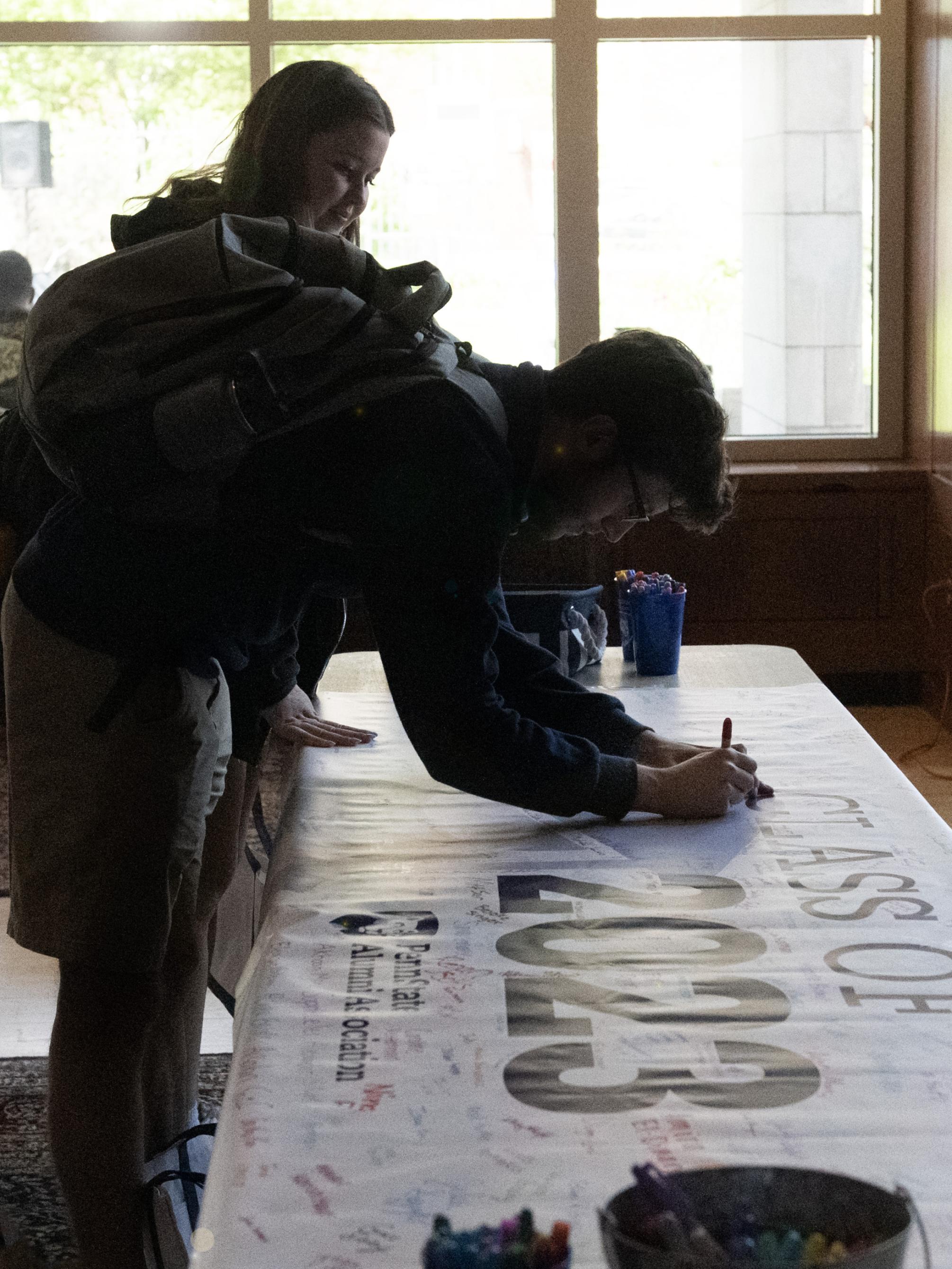signing the class of 2023 banner