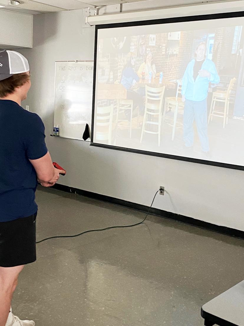 First-year criminal justice student Cole Remsnyder participates in PSP use of force simulator training.