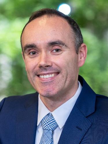 A headshot of Sean Rankin.