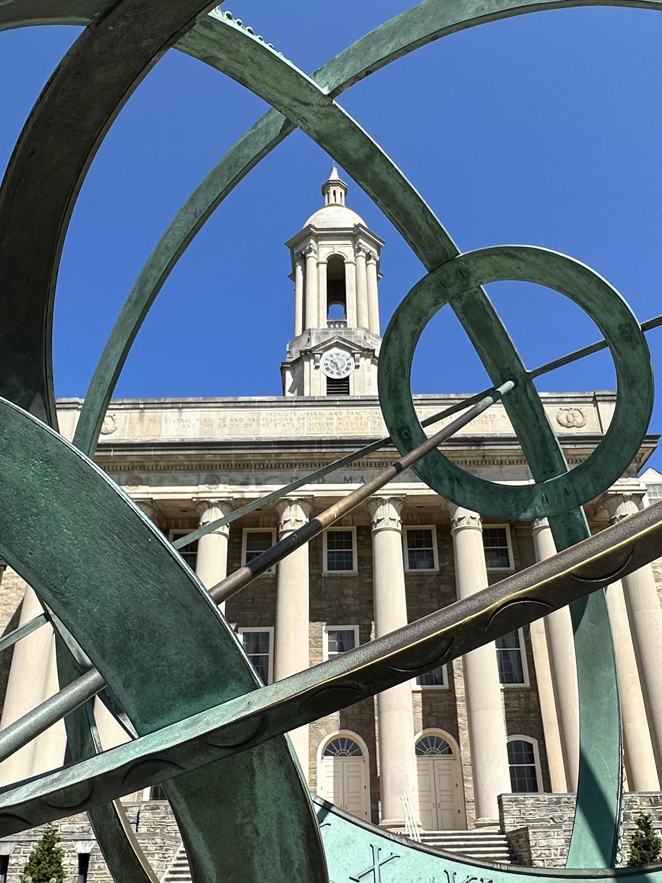 Old Main viewed through Armillary Sphere