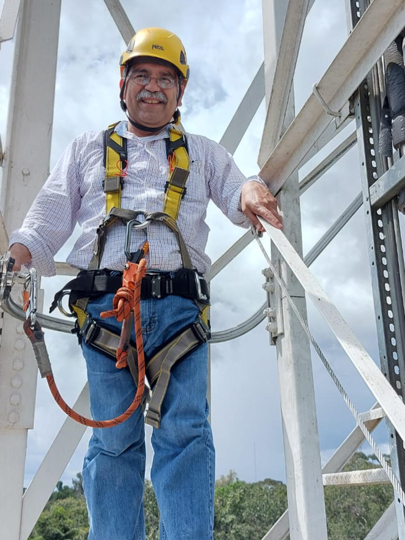Jose D. Fuentes stands on the Amazon Tall Tower Observatory