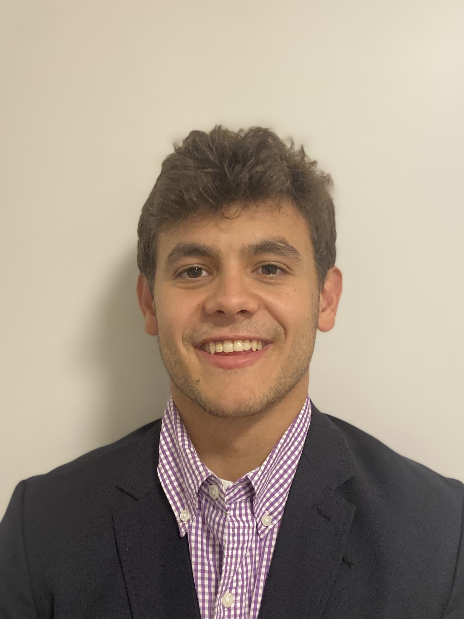 Head-and-shoulders photo of Pietro Elliot