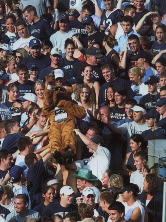 The Nittany Lion crowdsurfs in the student section at Beaver Stadium