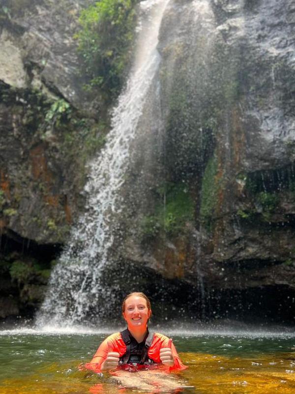 Alexandra Dyreson visiting a waterfall in Cuetzalan, Mexico