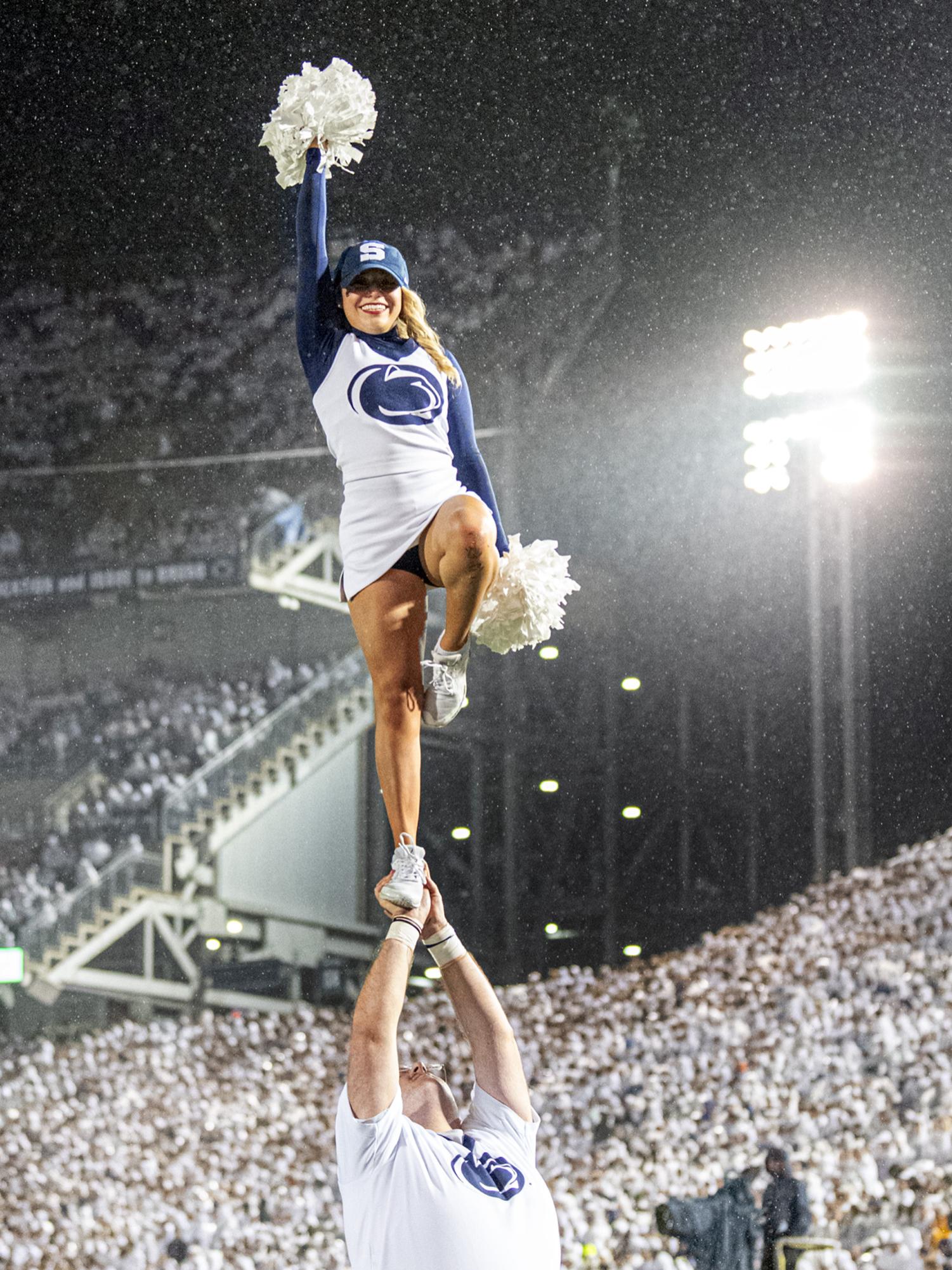 Cheerleaders at White Out vertical
