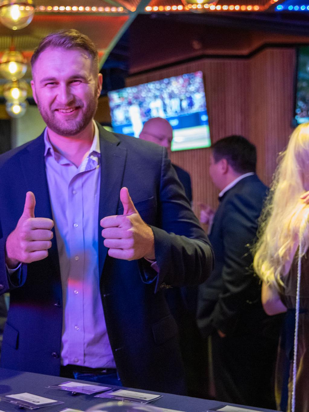 David Smith, a 2019 alumnus, checking in at the alumni reception.