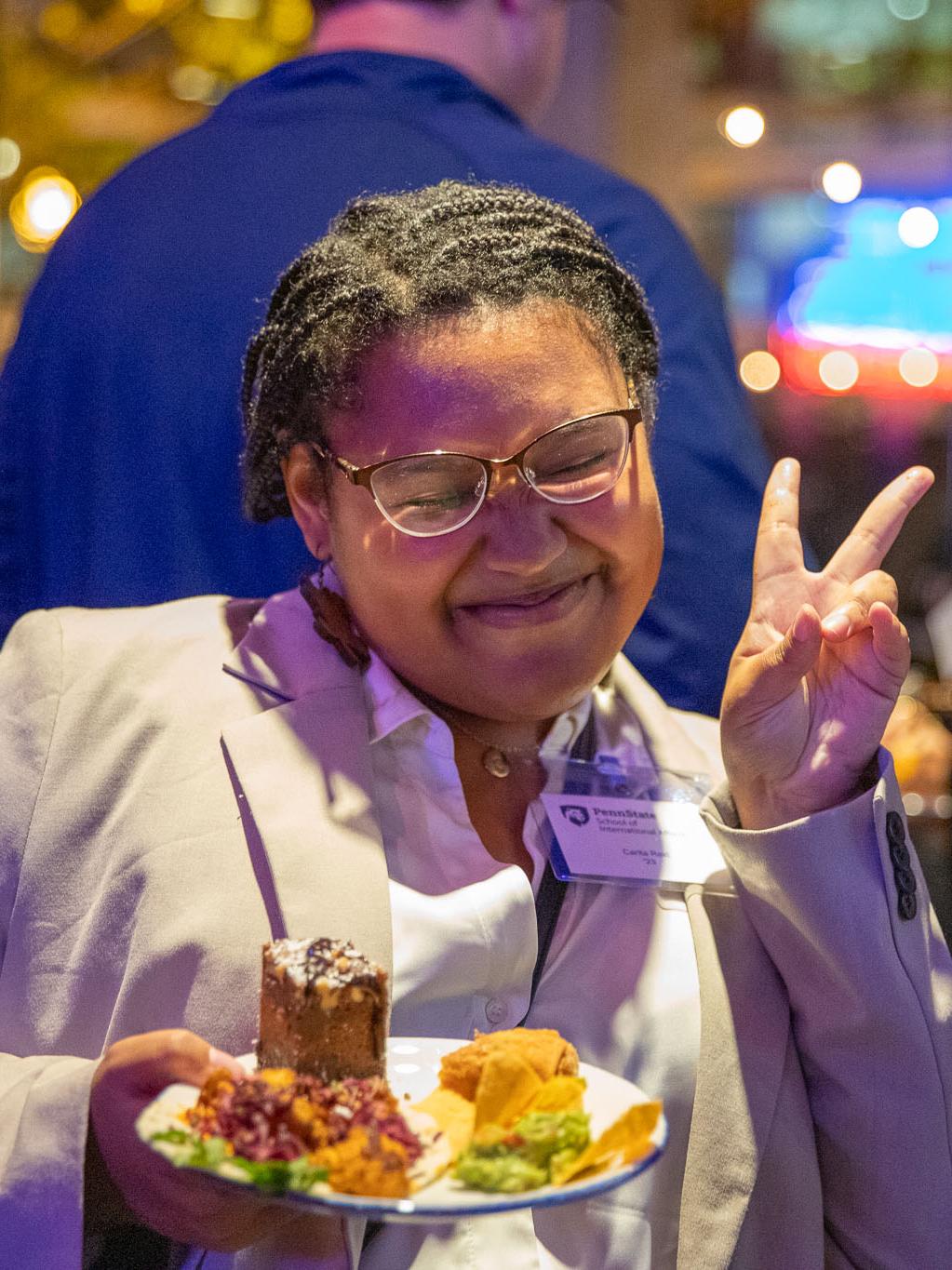 2023 alumna Carita Reid enjoying the reception.