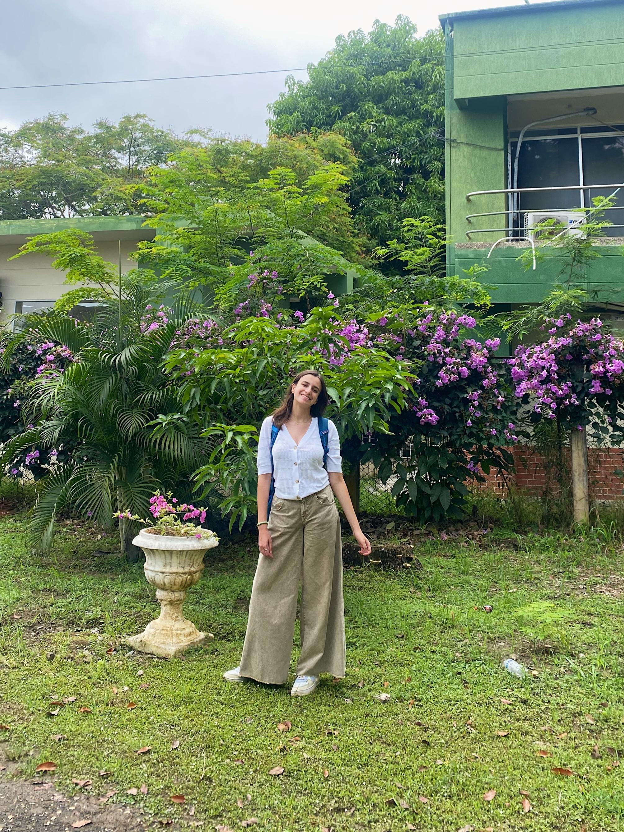 Luisina Kemanian-Leites standing in gardens in Colombia