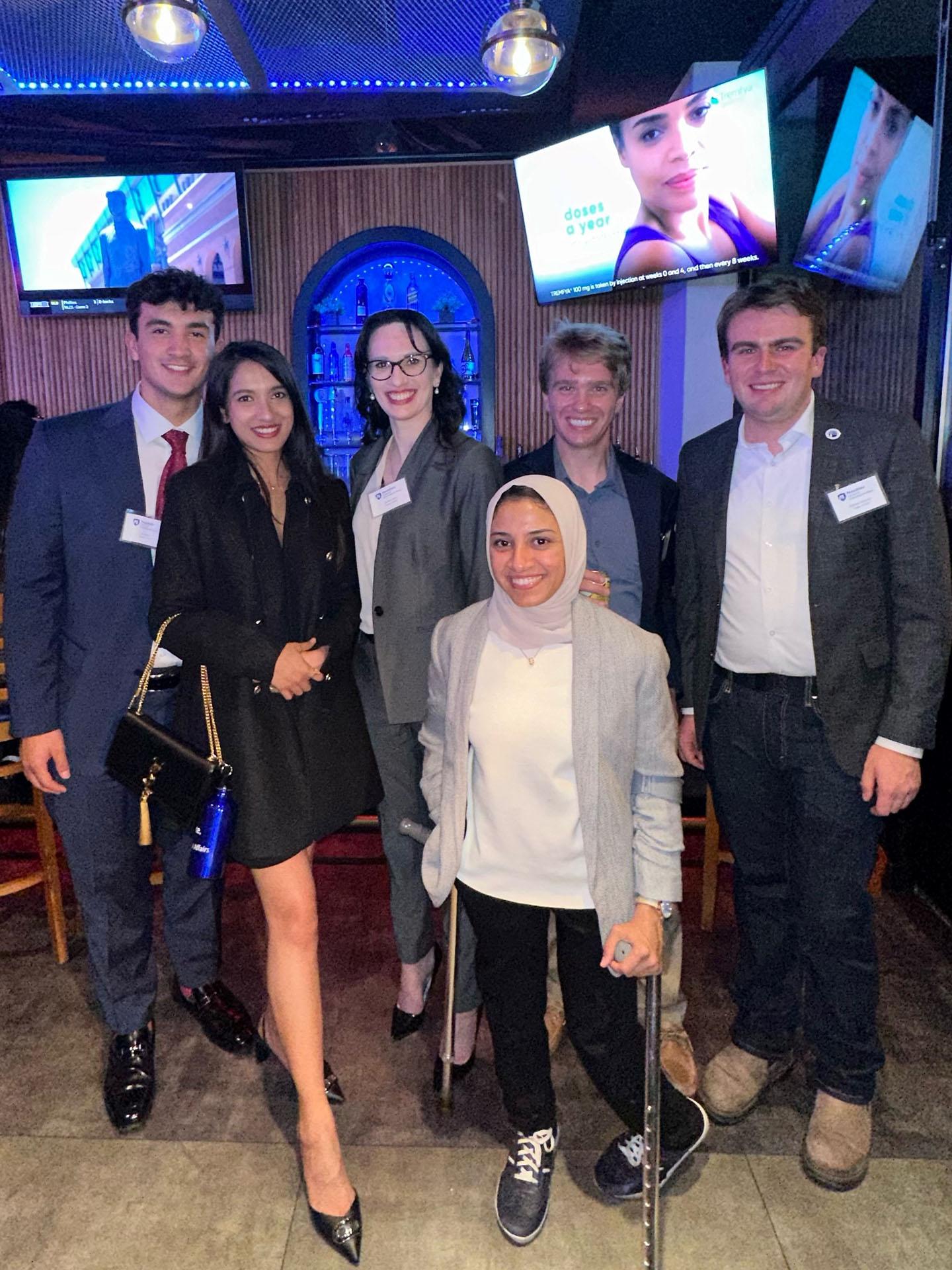 SIA students pose for a photo at the alumni reception in D.C.