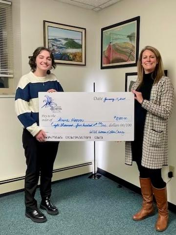 Penn State Altoona student Stevie Hoover receives a scholarship from the WISE Women of Blair County, presented by WISE Women Board President and Scholarship Chair Mandy Michelone.