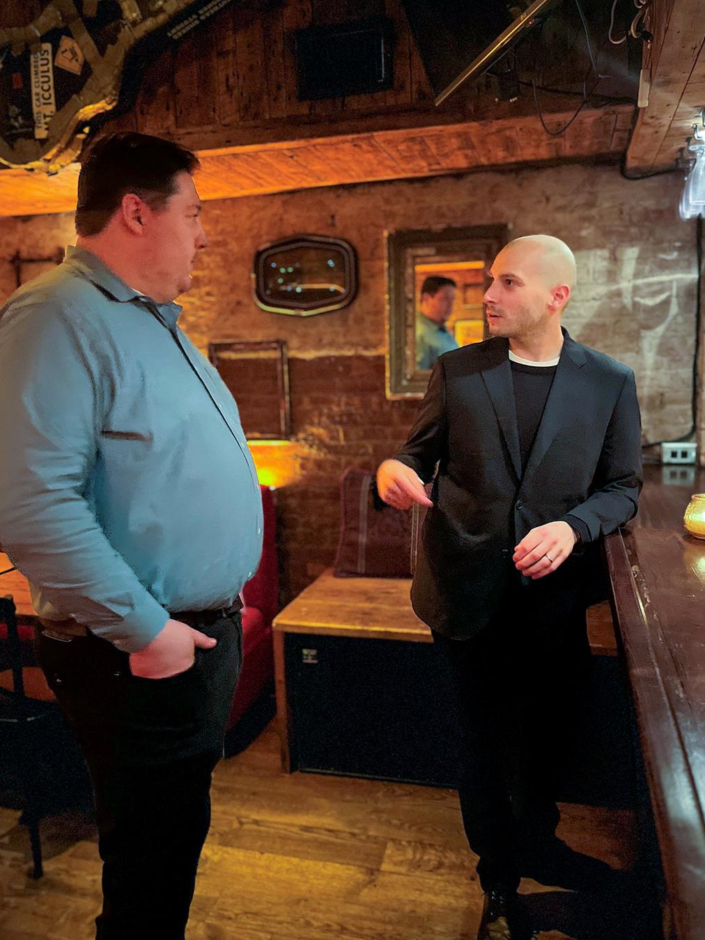 SIA alumnus Alfredo Malaret Baldo (right) speaking with current student Will Bame at the reception in New York.